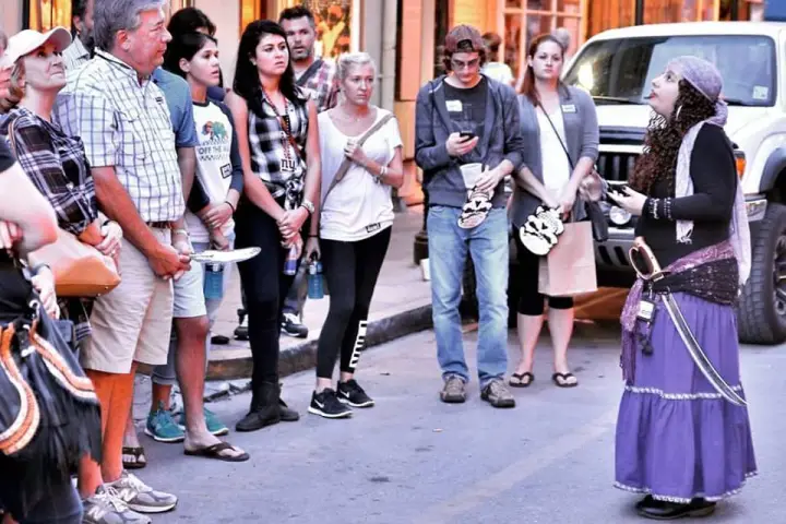Tour guide speaking to group
