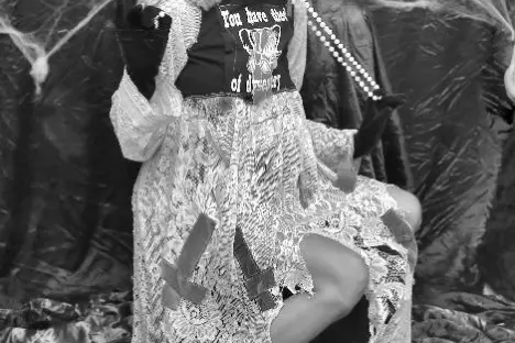 a girl is dressed in a costume