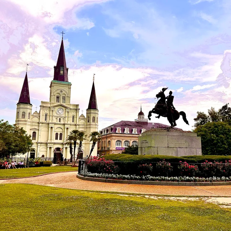 a castle on top of a grass covered field