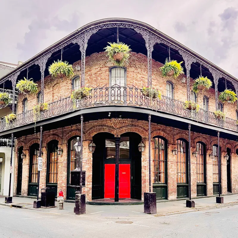a large building with French Quarter in the background