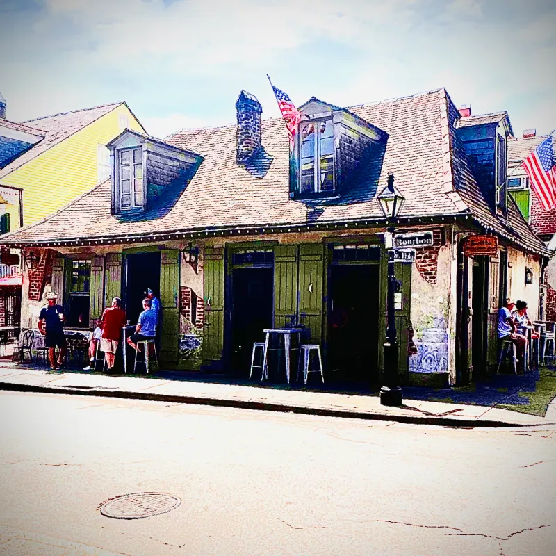 a group of people standing in front of a building