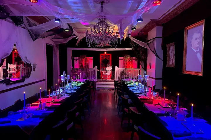 a group of people in a dark room